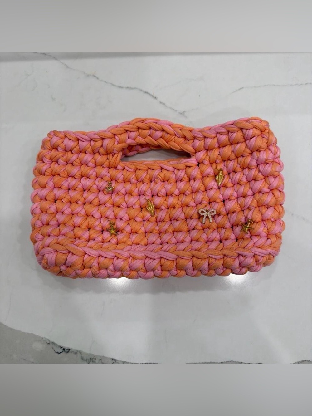 handmade pink + orange crochet charm clutch bag